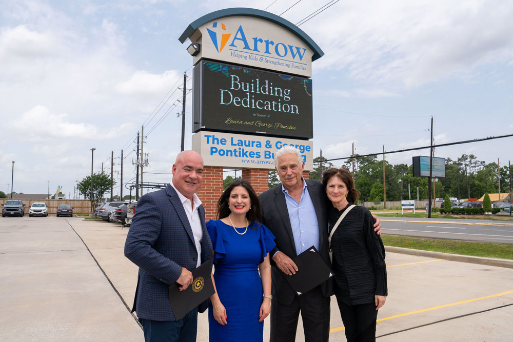 inside arrows uplifting building dedication event